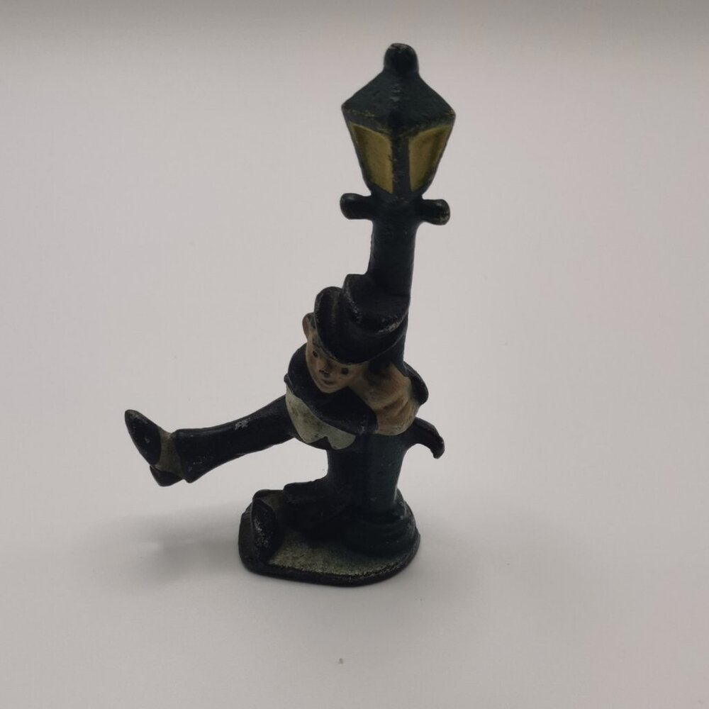 Vintage Cast Iron bottle opener, Figure, Man Holding On Lamppost, 4.25"x2" - Picture 3 of 4